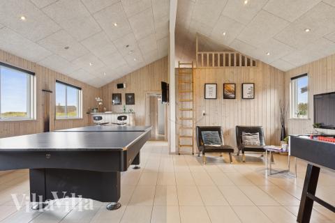 Neben den vielen schönen Stunden, die man im Poolbereich des Hauses verbringen kann, bietet das Luxusferienhaus 292 auch Spielevergnügen bei Billard/Tischtennis und Darts