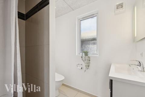 Eines der Badezimmer im Luxusferienhaus Nr. 292