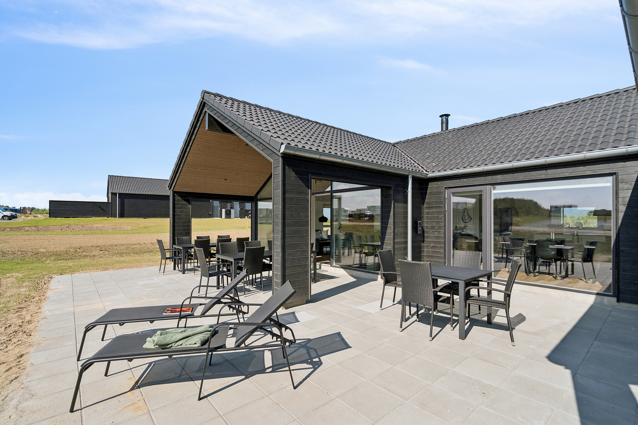 Das Luxusferienhaus Nr. 696 hat eine tolle Terrasse, die mit hochwertigen Gartenmöbeln für 18 Personen ausgestattet ist.