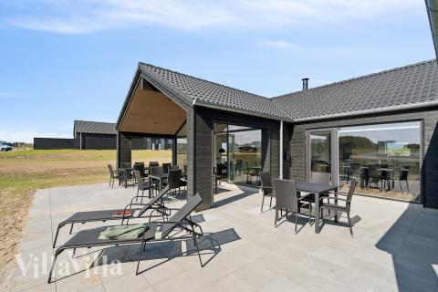 Das Luxusferienhaus Nr. 696 hat eine tolle Terrasse, die mit hochwertigen Gartenmöbeln für 18 Personen ausgestattet ist.