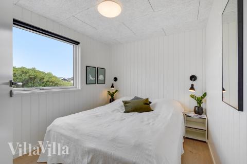 Eines der 7 Schlafzimmer im Luxusferienhaus Nr. 900