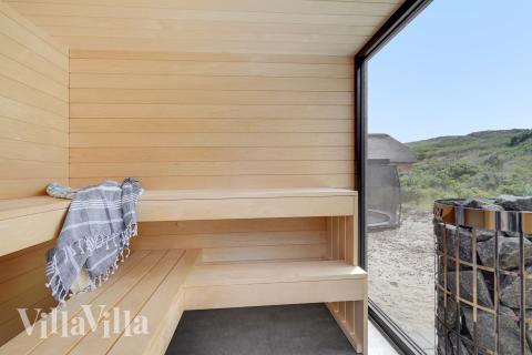 Genießen Sie die heiße Sauna im Luxusferienhaus Nr. 900 für 18 Personen