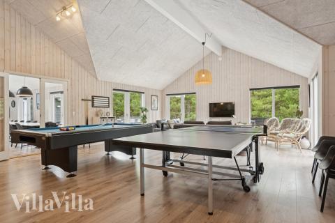 Aktivitätsraum im Luxusferienhaus Nr. 387 mit 9 Schlafzimmern und Platz für 24 Gäste.
