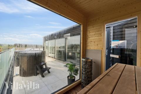 Genießen Sie die heiße Sauna im Luxusferienhaus Nr. 686 für 36 Personen