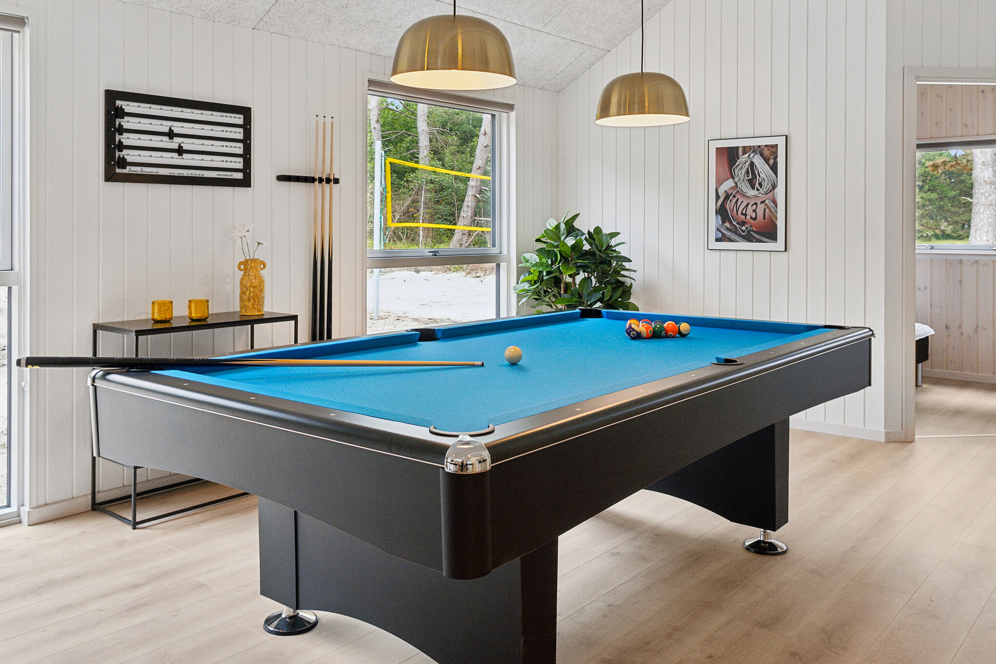 Neben den vielen schönen Stunden, die man im Poolbereich des Hauses verbringen kann, bietet das Luxusferienhaus 697 auch Spielevergnügen bei Billard/Tischtennis und Darts