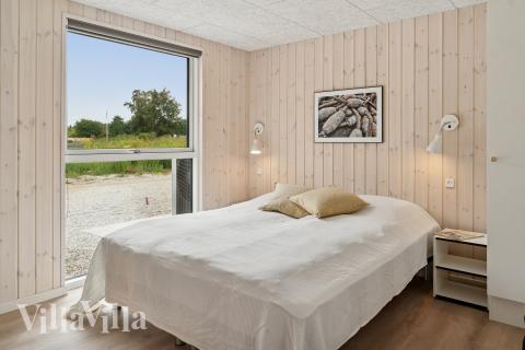 Eines der 8 Schlafzimmer im Luxusferienhaus Nr. 697