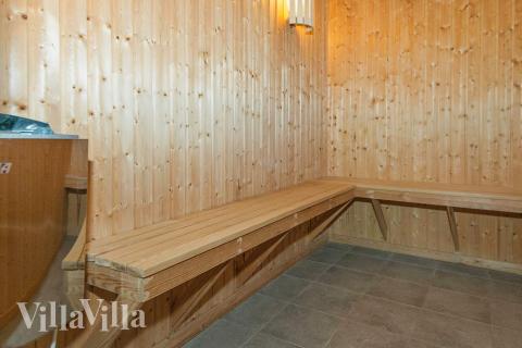 Genießen Sie die heiße Sauna im Luxusferienhaus Nr. 223 für 18 Personen