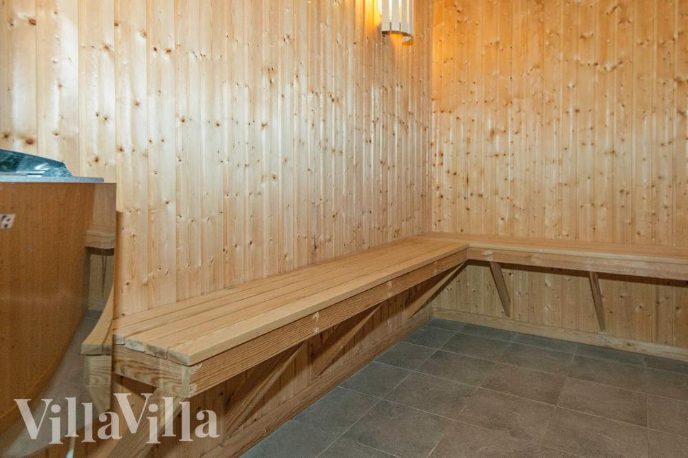Genießen Sie die heiße Sauna im Luxusferienhaus Nr. 223 für 18 Personen