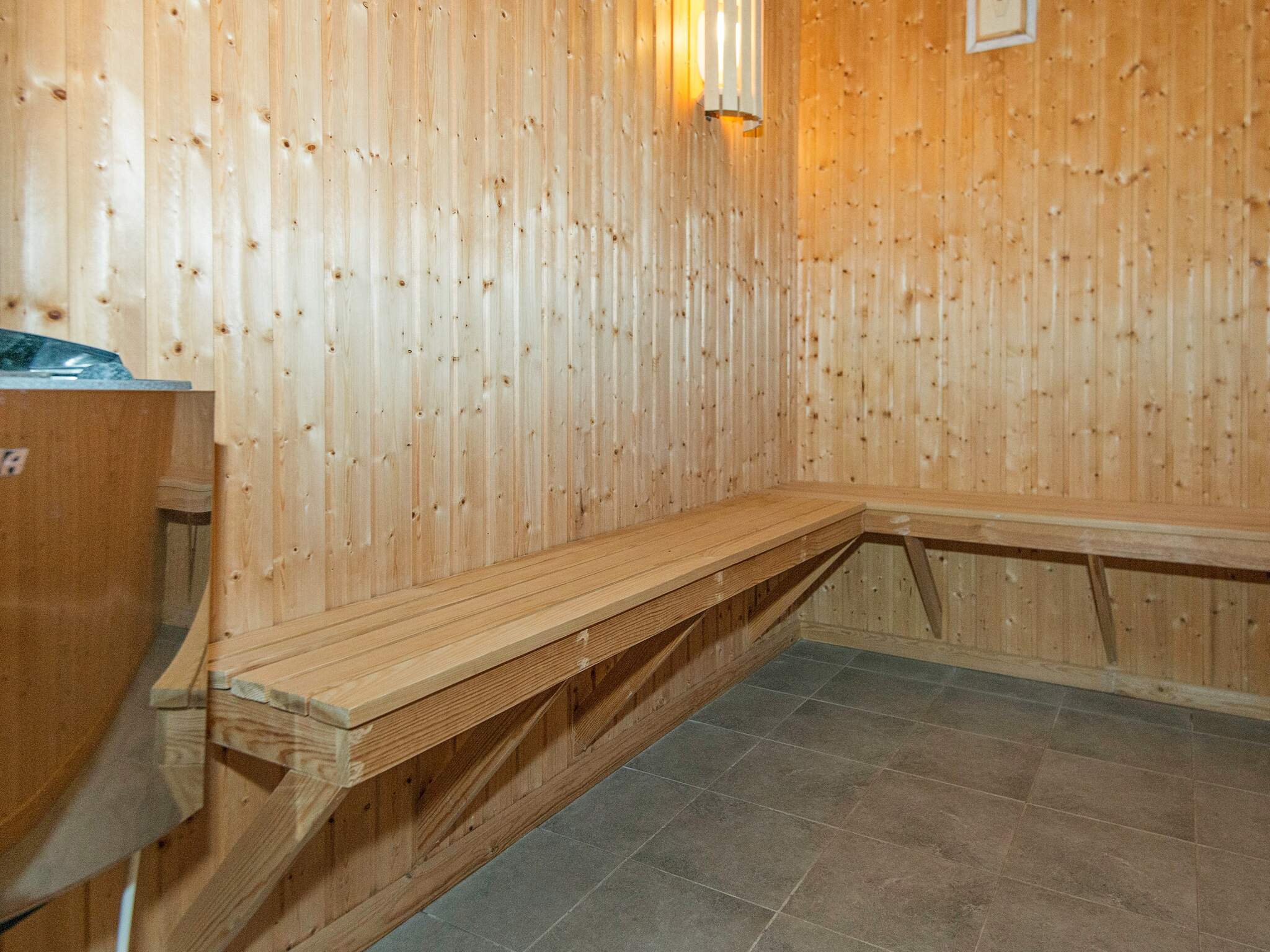 Genießen Sie die heiße Sauna im Luxusferienhaus Nr. 223 für 18 Personen