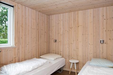 Eines der 7 Schlafzimmer im Luxusferienhaus Nr. 223