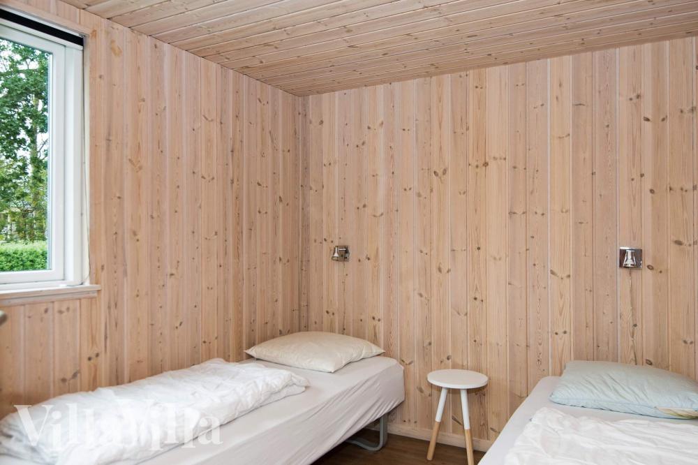 Eines der 7 Schlafzimmer im Luxusferienhaus Nr. 223