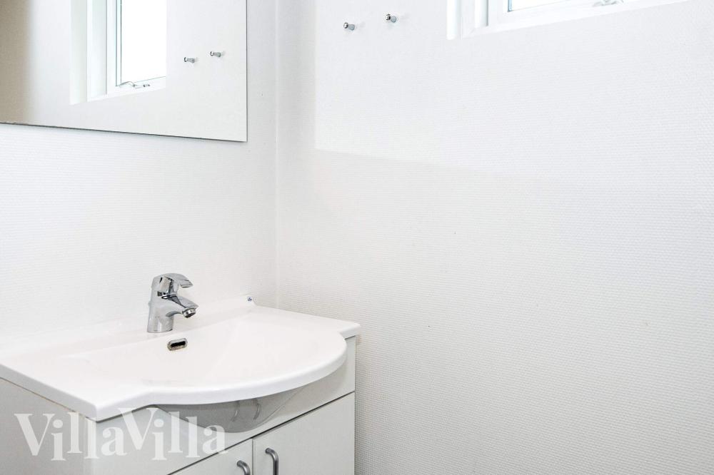Eines der Badezimmer im Luxusferienhaus Nr. 223