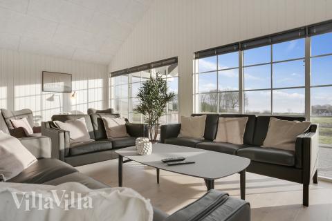 Die Couchecke im Luxusferienhaus Nr. 415 in Fünen und seine Inseln.