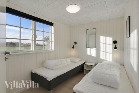 Eines der 10 Schlafzimmer im Luxusferienhaus Nr. 415