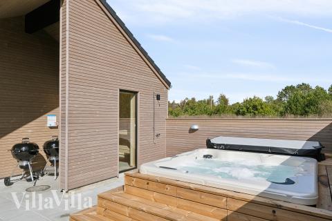 Im Luxusferienhaus Nr. 699 gibt es einen Whirlpool und 10 Schlafzimmer.