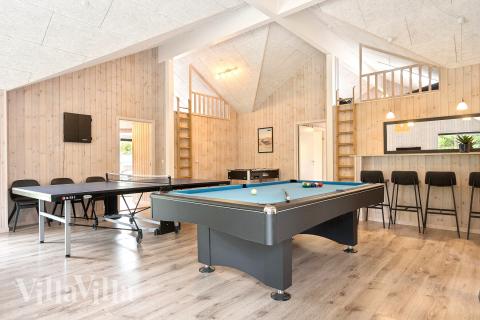 Neben den vielen schönen Stunden, die man im Poolbereich des Hauses verbringen kann, bietet das Luxusferienhaus 387 auch Spielevergnügen bei Billard/Tischtennis und Darts