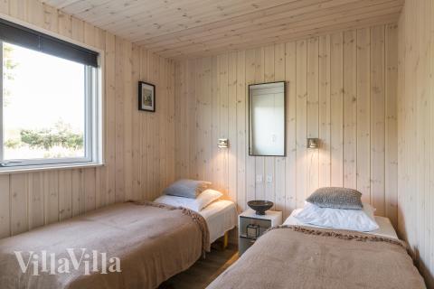 Eines der 9 Schlafzimmer im Luxusferienhaus Nr. 387