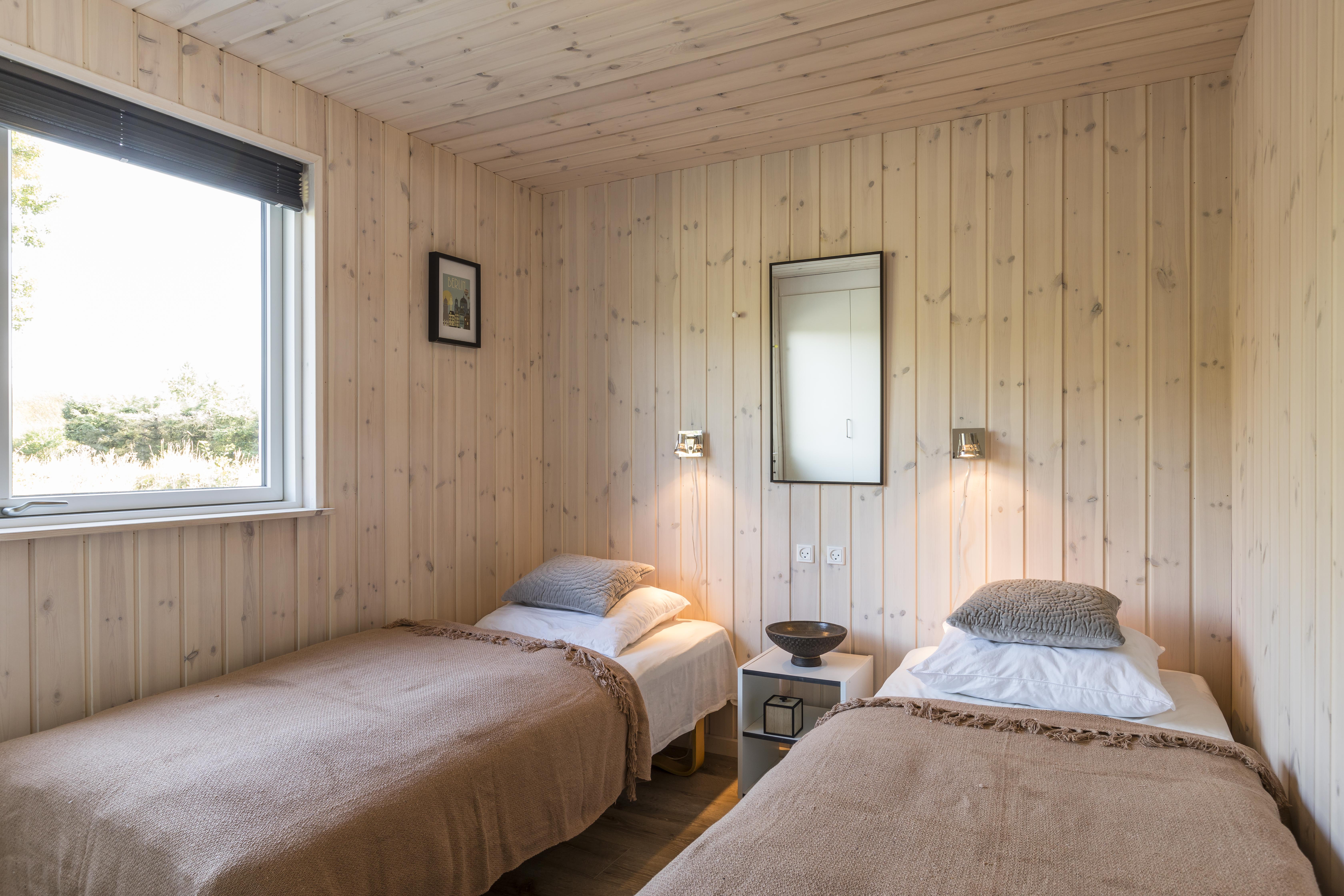 Eines der 9 Schlafzimmer im Luxusferienhaus Nr. 387