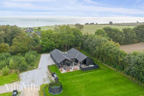 Dieses schöne Poolhaus Nr. 664 mit Platz für 16 Personen liegt in Südjütland