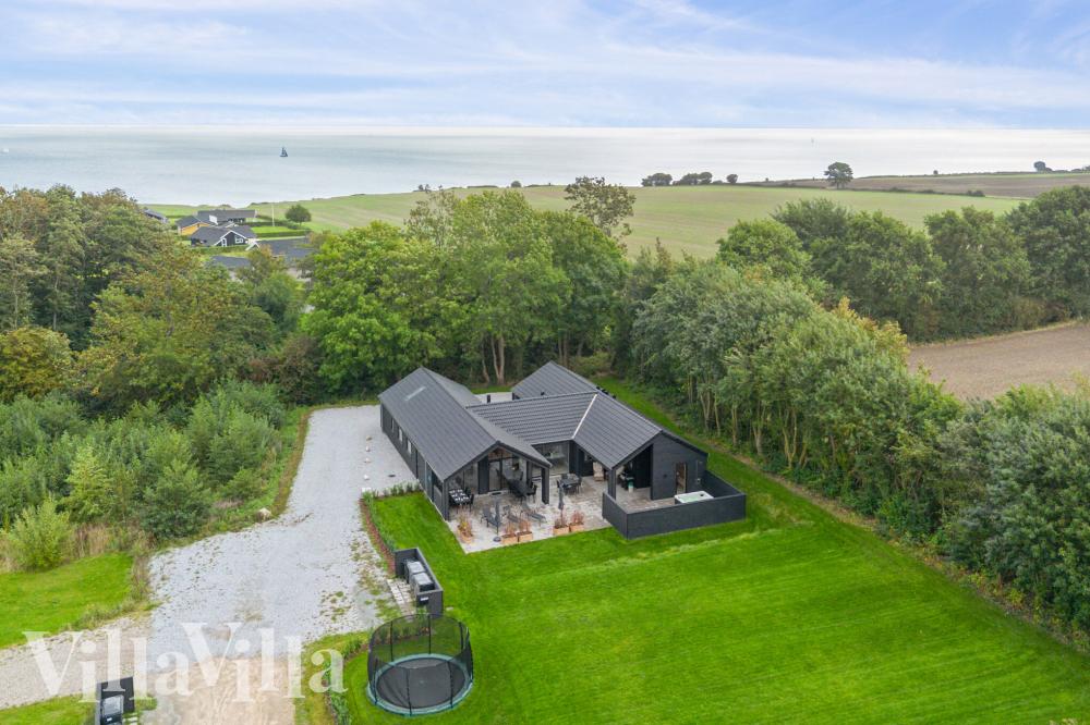 Dieses schöne Poolhaus Nr. 664 mit Platz für 16 Personen liegt in Südjütland