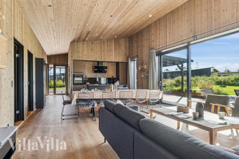 Aufenthaltsraum mit Platz für 12 im Luxusferienhaus Nr. 925.