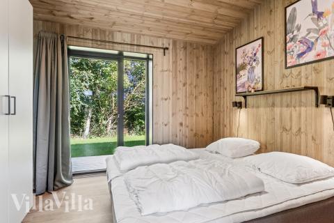 Eines der 5 Schlafzimmer im Luxusferienhaus Nr. 925