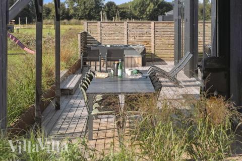 Das Luxusferienhaus Nr. 925 hat eine tolle Terrasse, die mit hochwertigen Gartenmöbeln für 12 Personen ausgestattet ist.