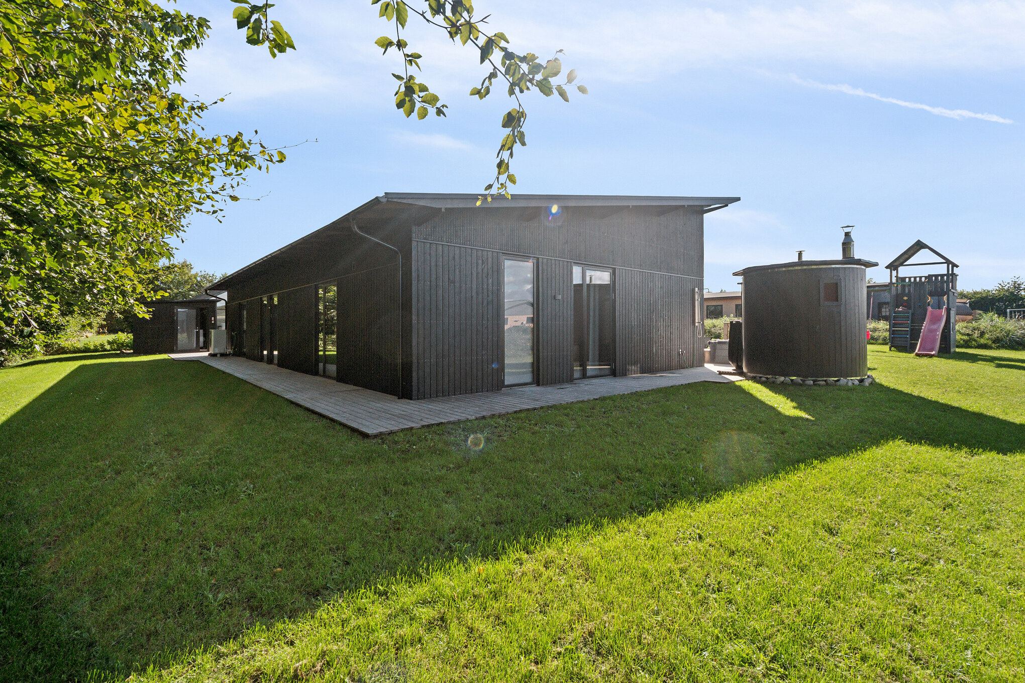 Diese schicke Haus mit Whirlpool Nr. 925 mit Platz für 12 Personen liegt in Limfjord