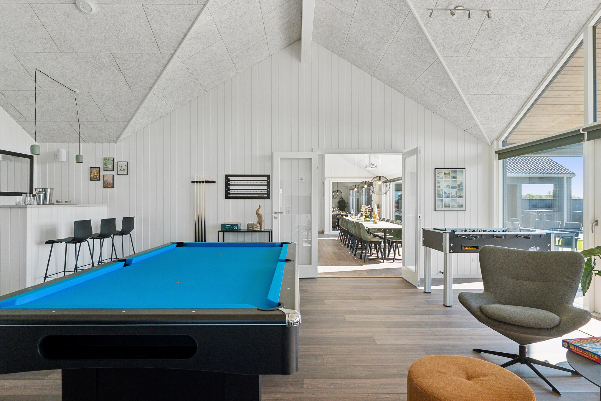 Neben den vielen schönen Stunden, die man im Poolbereich des Hauses verbringen kann, bietet das Luxusferienhaus 673 auch Spielevergnügen bei Billard/Tischtennis und Darts
