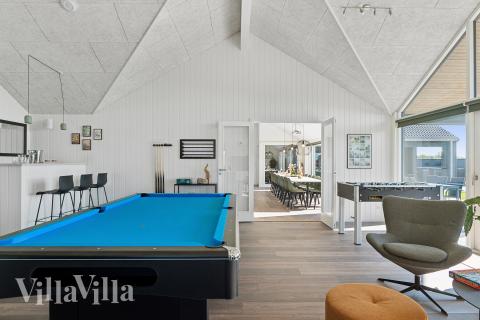 Neben den vielen schönen Stunden, die man im Poolbereich des Hauses verbringen kann, bietet das Luxusferienhaus 673 auch Spielevergnügen bei Billard/Tischtennis und Darts