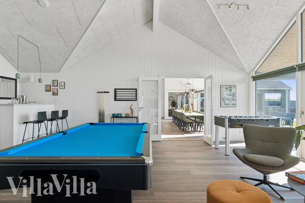 Neben den vielen schönen Stunden, die man im Poolbereich des Hauses verbringen kann, bietet das Luxusferienhaus 673 auch Spielevergnügen bei Billard/Tischtennis und Darts