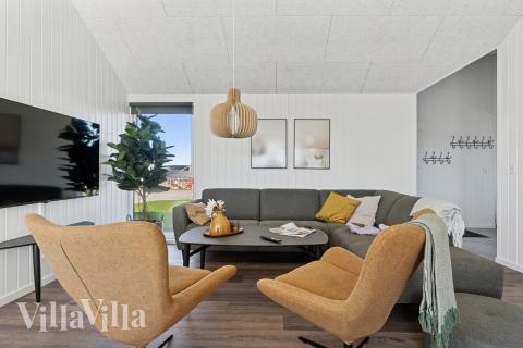 Die Couch im Luxusferienhaus Nr. 673 in Fünen und seine Inseln lädt zu Gesellschaftsspielen oder zu Kinoabenden ein.