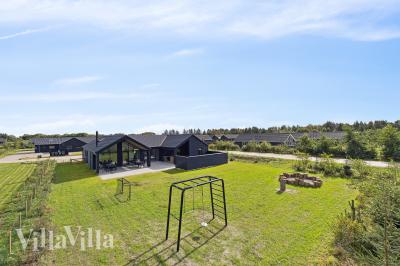 Dieses schöne Poolhaus Nr. 698 mit Platz für 14 Personen liegt in Westjütland