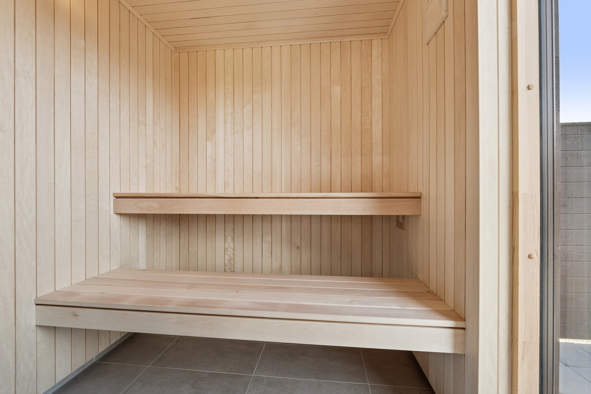 Genießen Sie die heiße Sauna im Luxusferienhaus Nr. 698 für 14 Personen