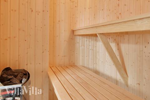 Genießen Sie die heiße Sauna im Luxusferienhaus Nr. 293 für 22 Personen