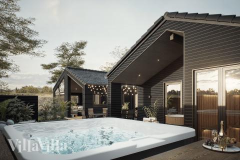 Genießen Sie den warmen Whirlpool im Luxusferienhaus Nr. 931 in Ostjütland