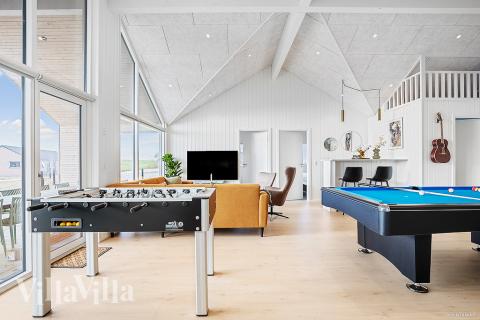 Das Luxusferienhaus 901 für 24 Personen hat einen großen Aktivitätsraum mit u. a. Billard und Darts