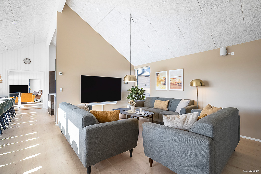 Die Couch im Luxusferienhaus Nr. 901 in Fünen und seine Inseln lädt zu Gesellschaftsspielen oder zu Kinoabenden ein.