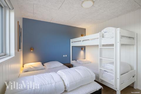 Eines der 8 Schlafzimmer im Luxusferienhaus Nr. 901