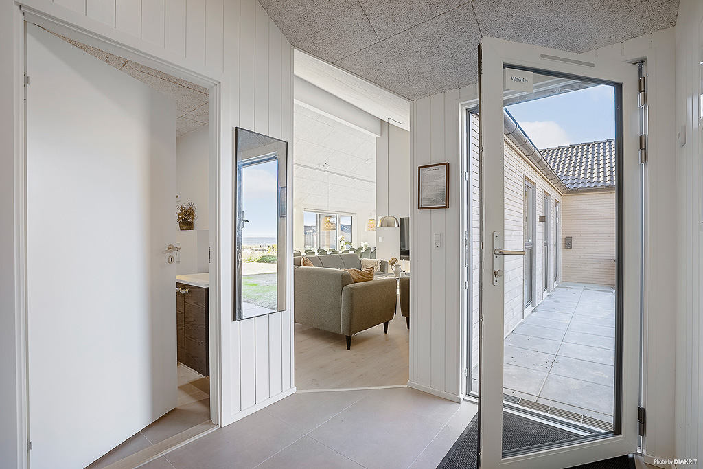 Der geräumige Eingangsbereich im Luxusferienhaus Nr. 901 in Fünen und seine Inseln