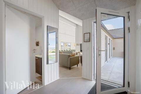Der geräumige Eingangsbereich im Luxusferienhaus Nr. 901 in Fünen und seine Inseln