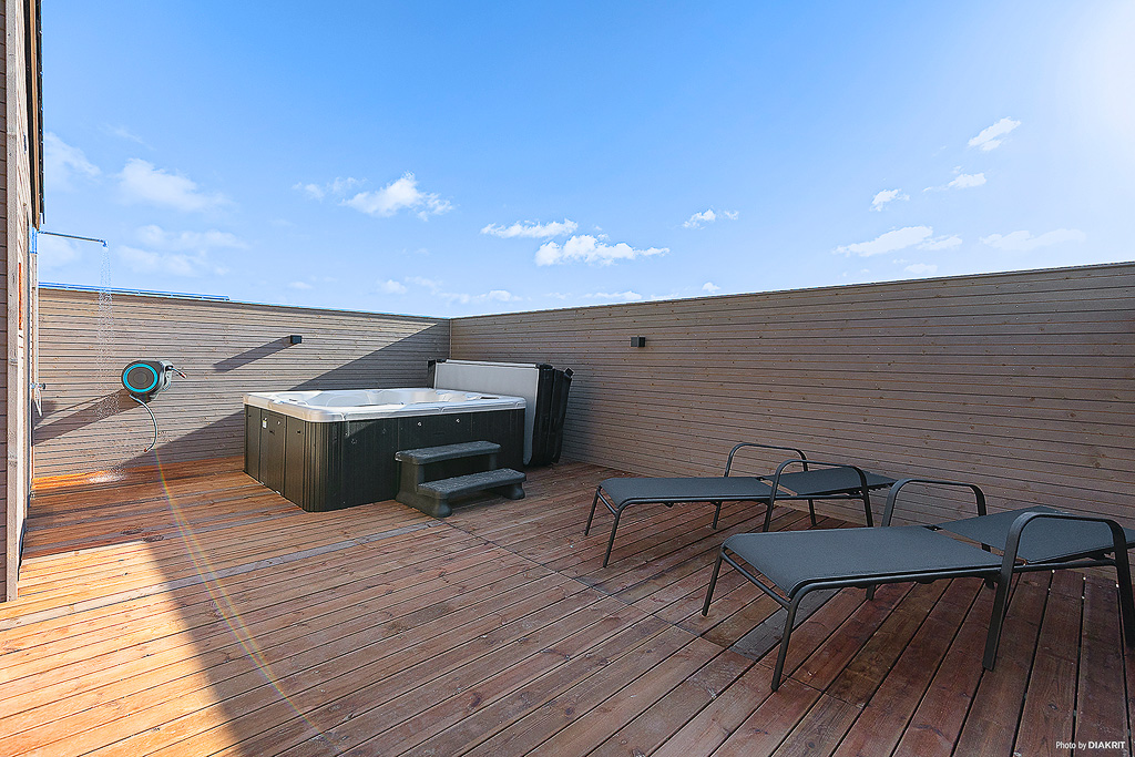 Genießen Sie den warmen Whirlpool im Luxusferienhaus Nr. 901 in Fünen und seine Inseln