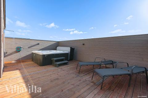 Genießen Sie den warmen Whirlpool im Luxusferienhaus Nr. 901 in Fünen und seine Inseln