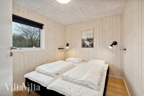 Eines der 7 Schlafzimmer im Luxusferienhaus Nr. 912