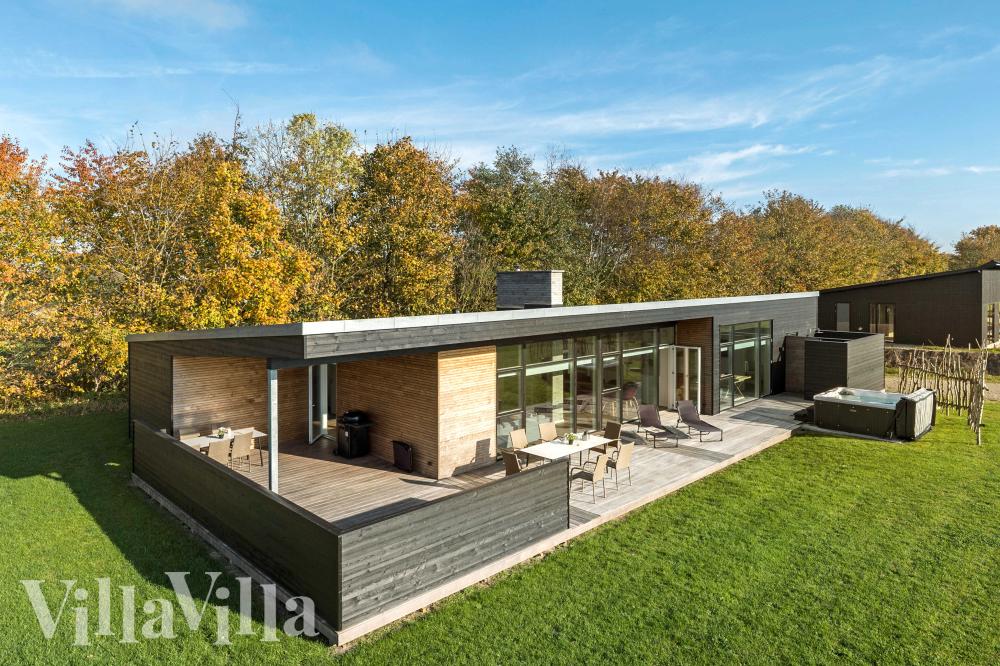 Diese schicke Haus mit Whirlpool Nr. 936 mit Platz für 10 Personen liegt in Ostjütland
