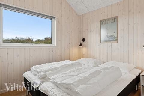 Eines der 7 Schlafzimmer im Luxusferienhaus Nr. 902
