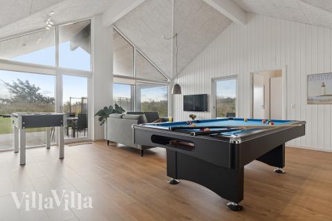 Das Luxusferienhaus 902 für 18 Personen hat einen großen Aktivitätsraum mit u. a. Billard und Darts