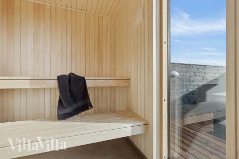 Genießen Sie die heiße Sauna im Luxusferienhaus Nr. 902 für 18 Personen