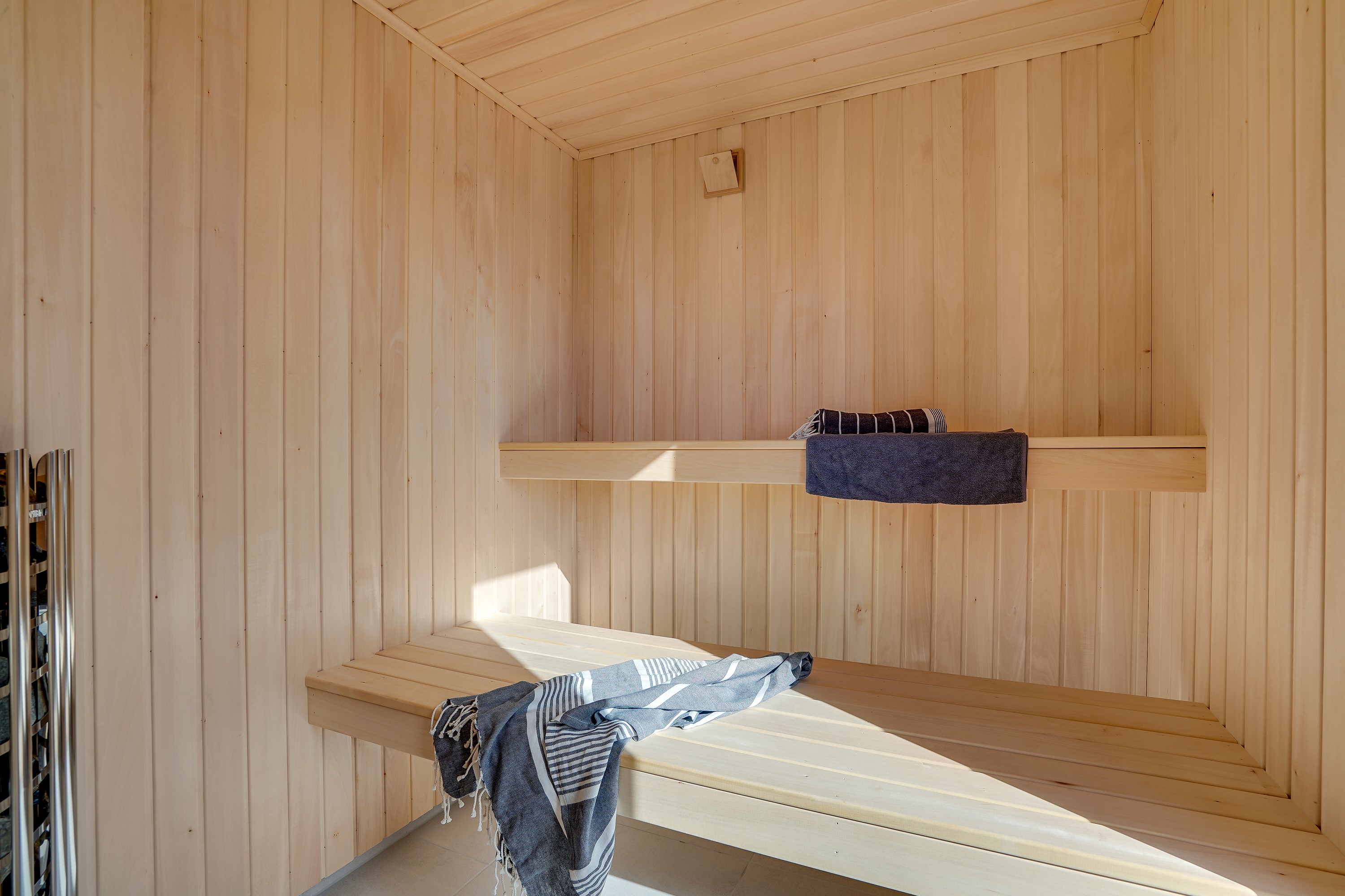 Genießen Sie die heiße Sauna im Luxusferienhaus Nr. 918 für 18 Personen