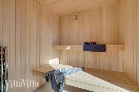 Genießen Sie die heiße Sauna im Luxusferienhaus Nr. 918 für 18 Personen